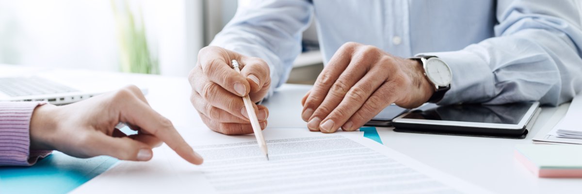 Business people negotiating a contract Business people negotiating a contract