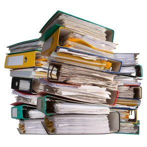 piles of file binder with documents