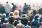 Blurred Crowd of People On stadium or ather populous place, unrecognizable crowded population as blur urban background Blurred Crowd of People On stadium or ather populous place, unrecognizable crowded population as blur urban background