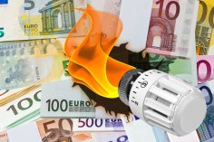Heater valve with flame burns euro banknotes energy costs concep Heater valve with flame burns euro banknotes energy costs concep
