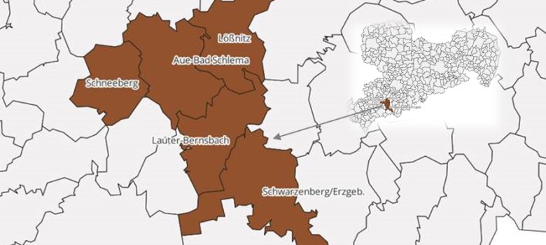 Zusehen ist ein Ausschnitt einer Landkarte von Sachsen mit allen Gemeindegrenzen. Die Städte Aue-Bad Schlema, Lauter-Bernsbach, Lößnitz, Schneeberg und Schwarzenberg bilden einen Verbund und wurden gleich eingefärbt.